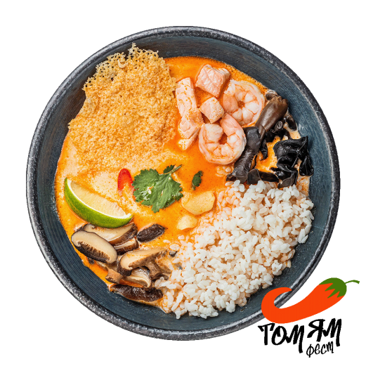 Soup Tom Yam with salmon, shrimp and stewed rice